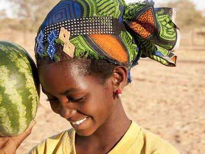 Girl holding a watermelon