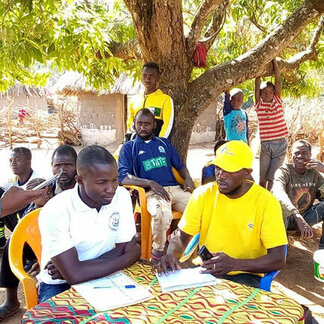 Cash distribution under the Food Assistance for Assets (FFA) programme at Beyla (Nzerekore) Guinea
