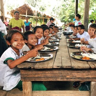 Children eating healthy and nutritious school meals