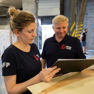 WFP staff working in a warehouse